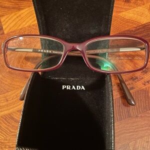 Prada women’s eyeglass frames. 52016. Made in Italy. For frames only.